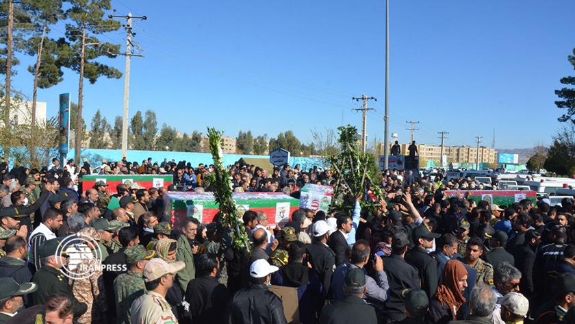 Iranpress: People bid farewell to martyrs of Rask terrorist attack